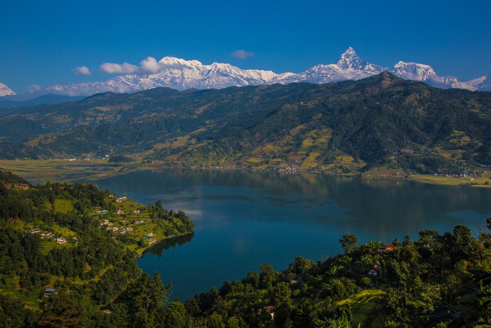 Boats on Phewa Lake with Annapurna range, Pokhara