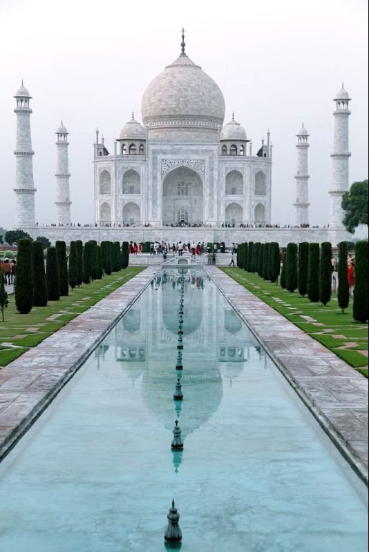 The Taj Mahal reflected in the long water channel
