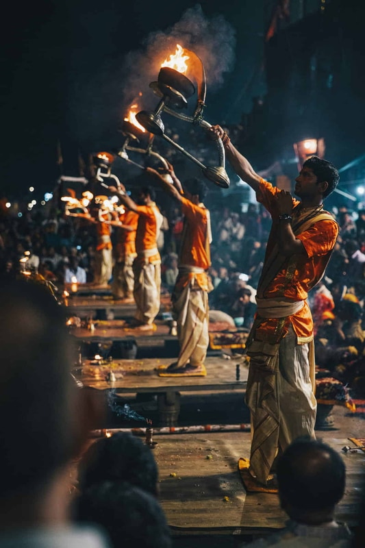 Ganga Aarti priests with lamps