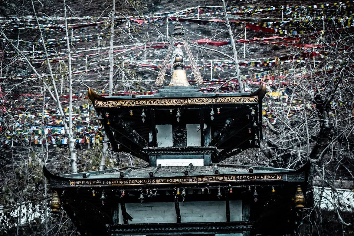 Muktinath Temple with prayer flags, Mustang