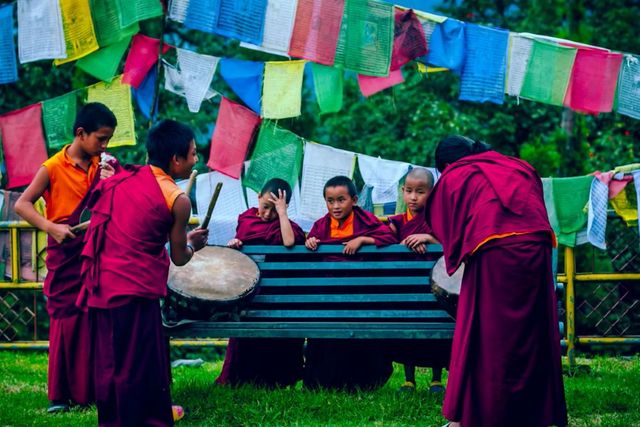 Young monks practising with a drum
