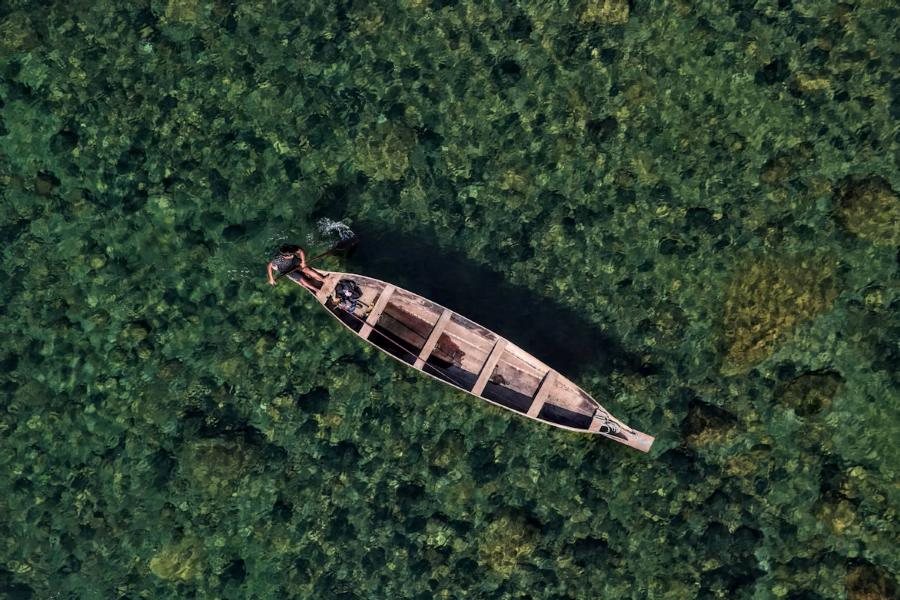 Boat on the crystal-clear Umngot river, Dawki